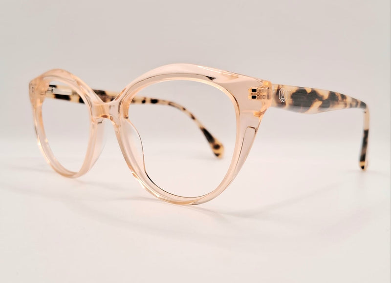 Óculos em Acetato Salmão Transparente com Hastes em Animal Print: Onde Sofisticação Encontra Audácia