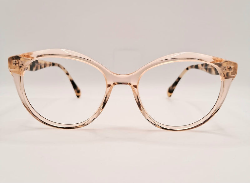 Óculos em Acetato Salmão Transparente com Hastes em Animal Print: Onde Sofisticação Encontra Audácia