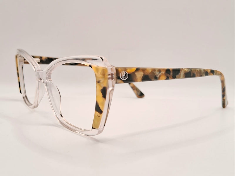 Armação em acetato transparente com detalhes e hastes laterais em animal print